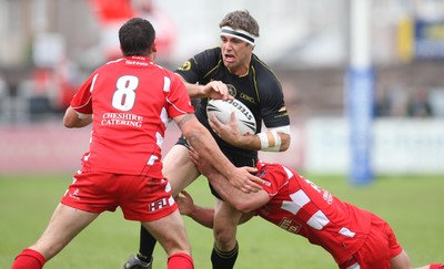 10.08.08 -  Celtic Crusaders v Leigh Centurions. Crusaders Darren Mapp takes on Centurions Aaron Smith and Mike Morrison   