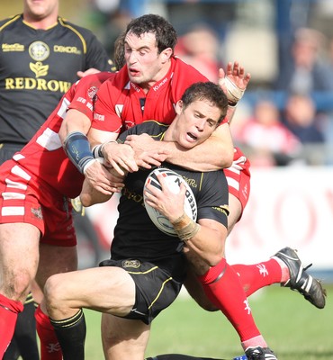 10.08.08 -  Celtic Crusaders v Leigh Centurions. Crusaders Chris Beasley is tackled short of the line 