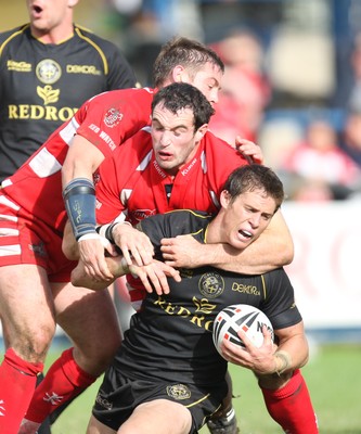 10.08.08 -  Celtic Crusaders v Leigh Centurions. Crusaders Chris Beasley is tackled short of the line 