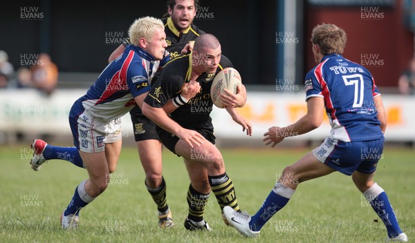 23.06.07.. Celtic Crusaders v Workington Town, Rugby League Crusaders Neil Budworth tries to hold off Shaun Lunt 