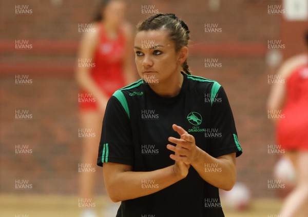 210522 - Celtic Dragons v Strathclyde Sirens, Vitality Netball Superleague - Nia Jones of Celtic Dragons warms up ahead of the match