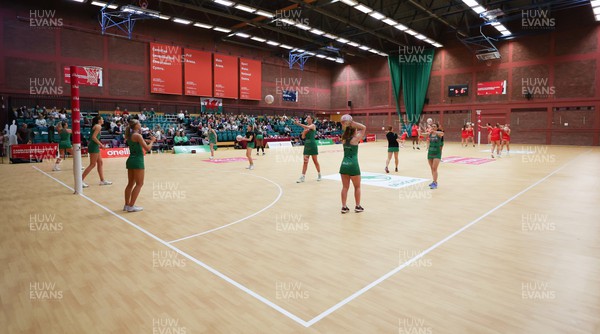210522 - Celtic Dragons v Strathclyde Sirens, Vitality Netball Superleague - Celtic Dragons team members warm up ahead of the match