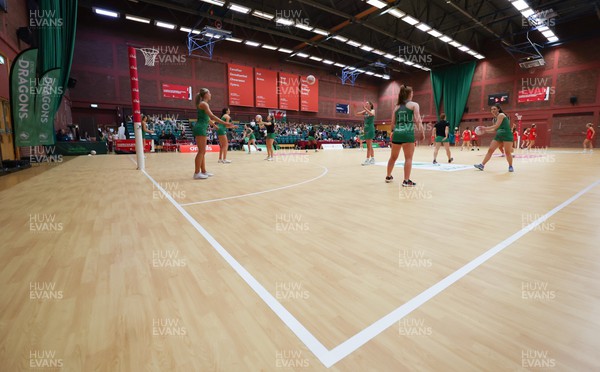 210522 - Celtic Dragons v Strathclyde Sirens, Vitality Netball Superleague - Celtic Dragons team members warm up ahead of the match
