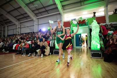 270323 - Celtic Dragons v Strathclyde Sirens - Vitality Netball Super League - Rachel Dunn of Celtic Dragons with mascot