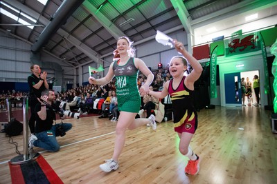 270323 - Celtic Dragons v Strathclyde Sirens - Vitality Netball Super League - Shona O'Dwyer of Celtic Dragons with mascot