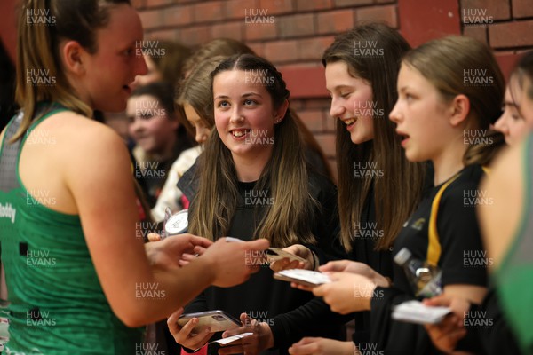 280322 - Celtic Dragons v Surrey Storm - Vitality Netball Superleague - Fans get autographs from players