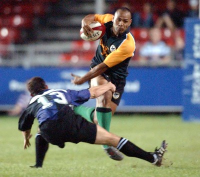 190903 - Celtic Warriors v Glasgow - Celtic Cup - Warriors' Aisea Havili gets past tackler J Steel