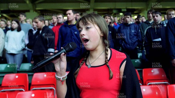 301099 - Singer Charlotte Church singing with choir during sound check at the Millennium Stadium in Cardiff where she will sing at the closing ceremony of the Rugby World Cup