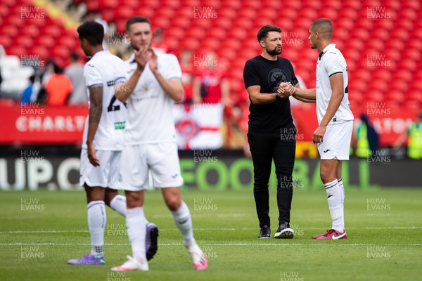 230722 - Charlton Athletic v Swansea City - Preseason Friendly - Russell Martin of Swansea City and Nathan Wood of Swansea City 