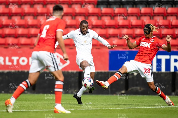 230722 - Charlton Athletic v Swansea City - Preseason Friendly - Olivier Ntcham of Swansea City and Sean Clare of Charlton battle for the ball