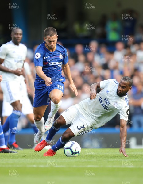 150918 - Chelsea v Cardiff City, Premier League - Eden Hazard of Chelsea is challenged by Junior Hoilett of Cardiff City