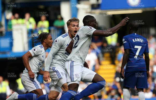 150918 - Chelsea v Cardiff City, Premier League - Sol Bamba of Cardiff City wheels away to celebrate with Danny Ward of Cardiff City after he scores goal