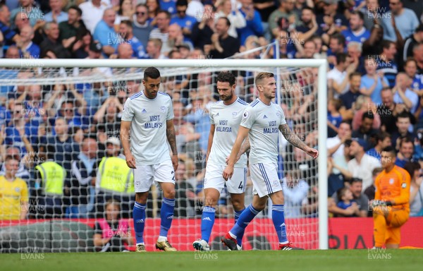 150918 - Chelsea v Cardiff City, Premier League - Cardiff City players show the dejection after Willian of Chelsea scores the fourth goal