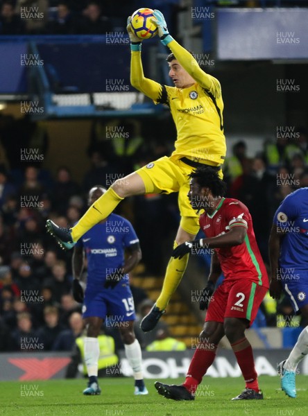 291117 - Chelsea v Swansea City, Premier League - Chelsea goalkeeper Thibaut Courtois claims the ball from Wilfried Bony of Swansea City