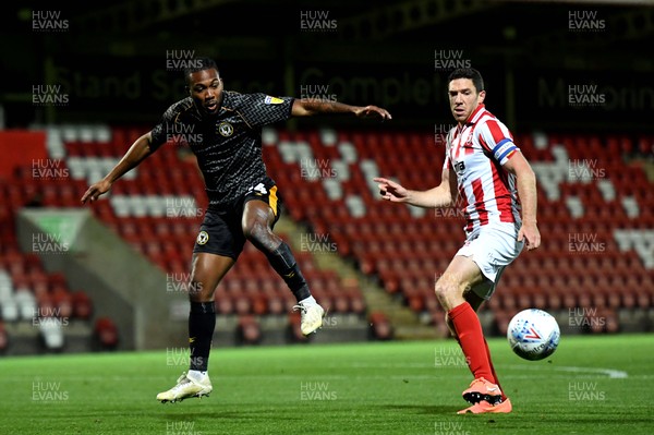 121119 - Cheltenham Town v Newport County - Leasingcom Trophy - Dominic Poleon of Newport County and Ben Tozer of Cheltenham Town compete
