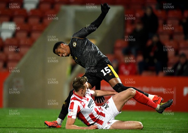121119 - Cheltenham Town v Newport County - Leasingcom Trophy - Tristan Abrahams of Newport County is tackled by William Boyle of Cheltenham Town