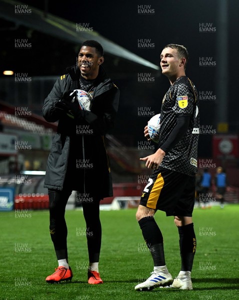 121119 - Cheltenham Town v Newport County - Leasingcom Trophy - Tristan Abrahams and Taylor Maloney of Newport County celebrate at the end of the game after both scoring hat tricks