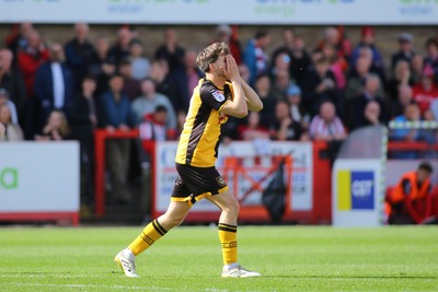 180426 - Cheltenham Town v Newport County - Sky Bet League 2 - Ben Lloyd of Newport County sees his shot deflected