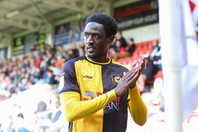 180426 - Cheltenham Town v Newport County - Sky Bet League 2 - Nathan Opoku of Newport County leaves the field with an injury