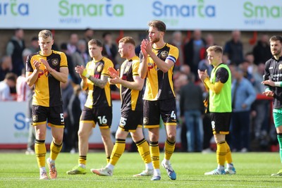 180426 - Cheltenham Town v Newport County - Sky Bet League 2 - Matt Baker of Newport County leads the applause to the travelling fans at the end of the game