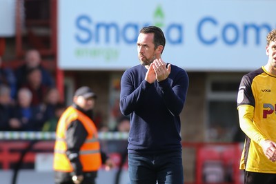 180426 - Cheltenham Town v Newport County - Sky Bet League 2 - Manager of Newport County Christian Fuchs applauds the travelling fans at the end of the game