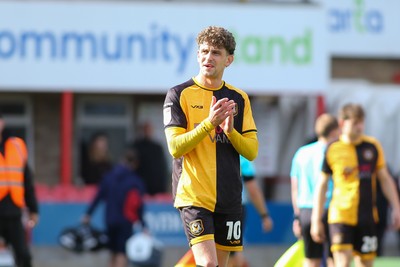 180426 - Cheltenham Town v Newport County - Sky Bet League 2 - Harrison Biggins of Newport County applauds the travelling fans at the end of the game