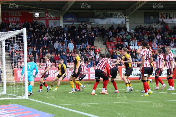 180426 - Cheltenham Town v Newport County - Sky Bet League 2 - Matt Baker of Newport County sees his header rebound off the cross bar