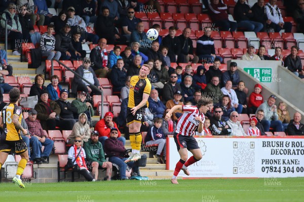 180426 - Cheltenham Town v Newport County - Sky Bet League 2 - Lee Jenkins of Newport County wins a high ball
