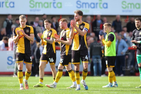 180426 - Cheltenham Town v Newport County - Sky Bet League 2 - Matt Baker of Newport County leads the applause to the travelling fans at the end of the game