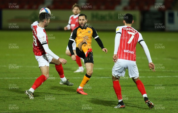 190121 - Cheltenham Town v Newport County, Sky Bet League 2 - Robbie Willmott of Newport County and Ellis Chapman of Cheltenham Town compete for the ball