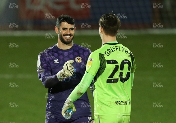 190121 - Cheltenham Town v Newport County, Sky Bet League 2 - Newport County goalkeeper Tom King speaks with his opposite number Cheltenham Town goalkeeper Josh Griffiths at the end of the match King scored the opening goal of the match with a long range shot from his own area that beat Griffiths