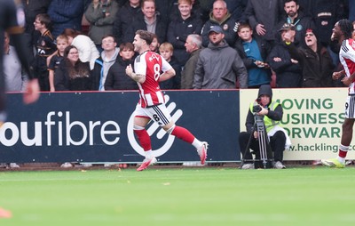 241026 Cheltenham Town v Newport County, EFL Sky Bet League 2 -  Charlie McCann of Cheltenham Town celebrates after scoring goal