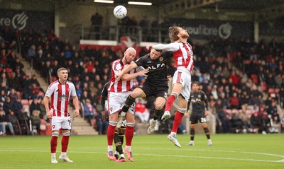 241026 Cheltenham Town v Newport County, EFL Sky Bet League 2 -  Lee Jenkins of Newport County looks to head at goal