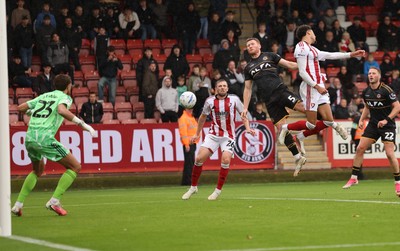 241026 Cheltenham Town v Newport County, EFL Sky Bet League 2 -  Lee Jenkins of Newport County looks to head at goal
