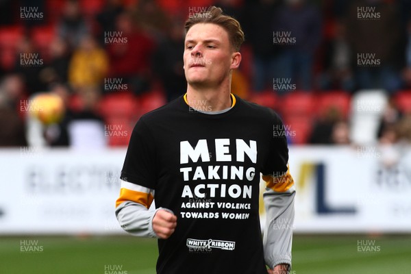 241118 - Cheltenham Town v Newport County - EFL SkyBet League 2 - Players of Newport County show their support against Domestic Violence  
