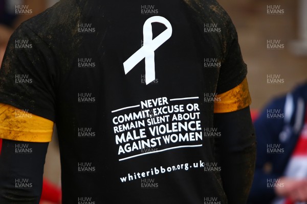 241118 - Cheltenham Town v Newport County - EFL SkyBet League 2 - Players of Newport County show their support against Domestic Violence  