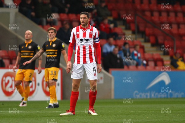 241118 - Cheltenham Town v Newport County - EFL SkyBet League 2 - Captain of Cheltenham Town Ben Tozer plays against his old club  
