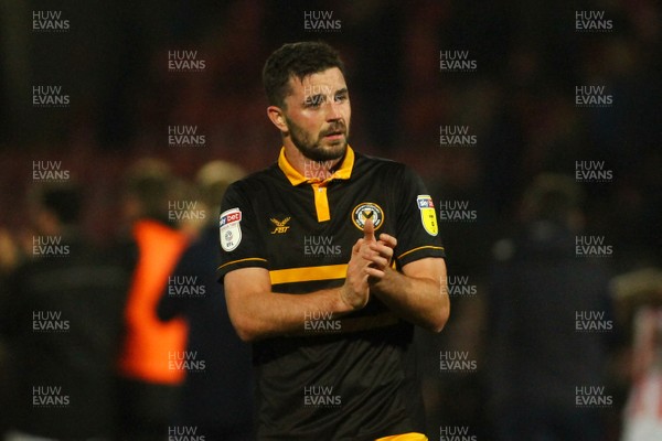 241118 - Cheltenham Town v Newport County - EFL SkyBet League 2 - A dejected Padraig Amond of Newport County applauds the traveling fans