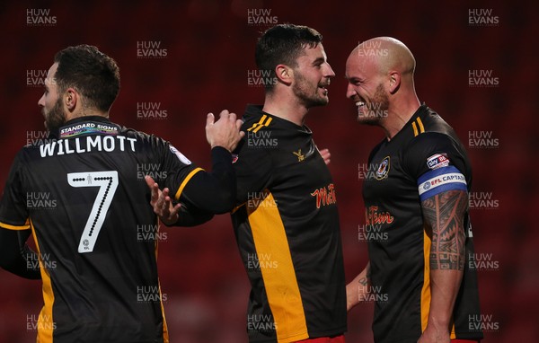 301217 - Cheltenham Town v Newport County - SkyBet League Two - Padraig Amond celebrates scoring a goal with Robbie Willmott and David Pipe of Newport County