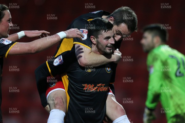 301217 - Cheltenham Town v Newport County - SkyBet League Two - Padraig Amond of Newport County celebrates scoring a goal with team mates