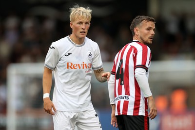 230725 - Cheltenham Town v Swansea City - Pre Season Friendly - Melker Widell of Swansea City 