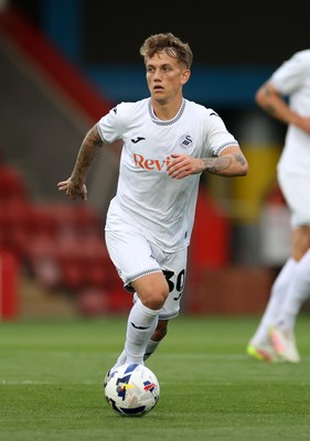 230725 - Cheltenham Town v Swansea City - Pre Season Friendly - Ethan Galbraith of Swansea City 