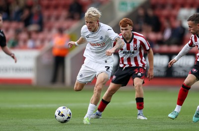 230725 - Cheltenham Town v Swansea City - Pre Season Friendly - Melker Widell of Swansea City 