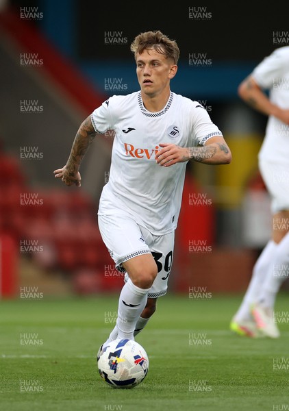 230725 - Cheltenham Town v Swansea City - Pre Season Friendly - Ethan Galbraith of Swansea City 