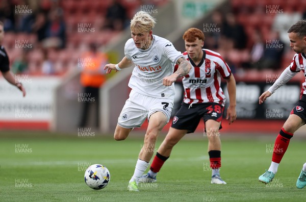 230725 - Cheltenham Town v Swansea City - Pre Season Friendly - Melker Widell of Swansea City 