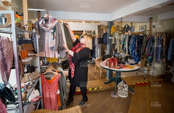 120421 Wales COVID 19 Restrictions Easing - Natalie Davies, owner of Orchard fashion in Chepstow, back trading in her shop for the first time this year as Wales eases lockdown restrictions allowing the opening of non-essential shops