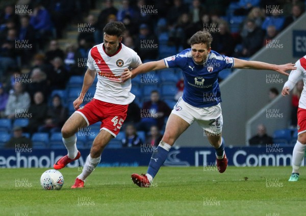 010518 - Chesterfield v Newport County, Sky Bet League 2 - Aaron Collins of Newport County holds off the challenge from Laurence Maguire of Chesterfield