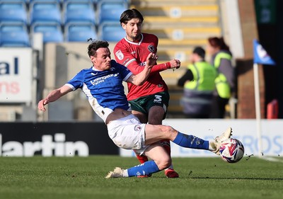 080325 - Chesterfield v Newport County - Sky Bet League 2 - Anthony Glennon of Newport and Liam Mandeville of Chesterfield