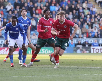 080325 - Chesterfield v Newport County - Sky Bet League 2 - Matt Baker of Newport celebrates scoring the 1st goal of the match with Bobby Kamwa of Newport