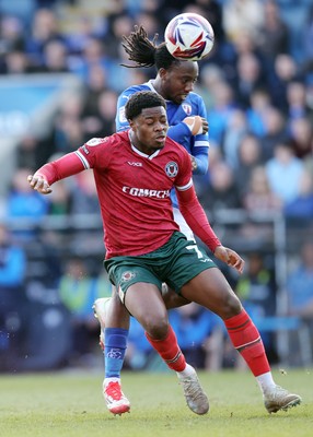 080325 - Chesterfield v Newport County - Sky Bet League 2 - Bobby Kamwa of Newport and Ryheem Sheckleford of Chesterfield